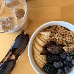 Yogurt and granola bowl, maple latte with smoked salt Yogurt and granola bowl, maple latte with smoked salt