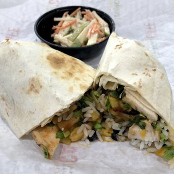 Tropical Smoothie Cafe - Caribbean Jerk Chicken Wrap with Kale Apple Slaw - Juice Bars & Smoothies Near Me - Olathe, Kansas Tropical Smoothie Cafe - Caribbean Jerk Chicken Wrap with Kale Apple Slaw - Juice Bars & Smoothies Near Me - Olathe, Kansas