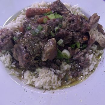 Victor’s Restaurant & Bar - OxTails with rice. - Hookah Bars Near Me - Dallas, Texas