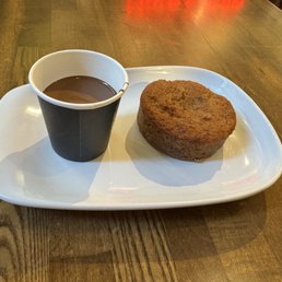 Shot of drinking chocolate and a banana bread Shot of drinking chocolate and a banana bread