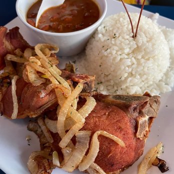 La Casita Martell - Chuleta (fried pork chop) with rice and beans - Bars Near Me - Bayamón, Puerto Rico La Casita Martell - Chuleta (fried pork chop) with rice and beans - Bars Near Me - Bayamón, Puerto Rico