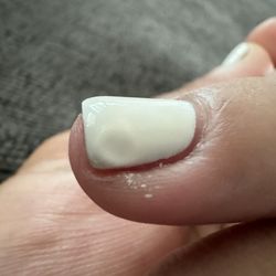DT Nails & Spa - They didn't let my nails cure completely before the next coat
