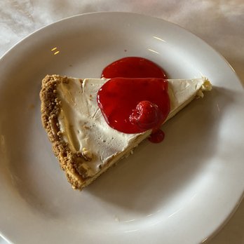 Anjou Restaurant - Cheesecake glazed in a fruit compote - French Near Me - Ridgeland, Mississippi Anjou Restaurant - Cheesecake glazed in a fruit compote - French Near Me - Ridgeland, Mississippi