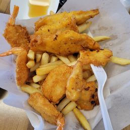 Fish with chips and 4 shrimp. Fish with chips and 4 shrimp.