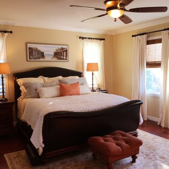 Lisa Esposito Design - a bedroom with a large bed - Landscaping Near Me Lisa Esposito Design - a bedroom with a large bed - Landscaping Near Me