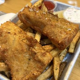 Fish and chips with seasoned fries Fish and chips with seasoned fries