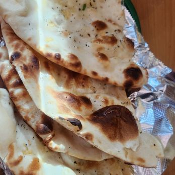 Shri Ganesh - Garlic, basil Naan bread - Indian Near Me - Colorado Springs, Colorado Shri Ganesh - Garlic, basil Naan bread - Indian Near Me - Colorado Springs, Colorado