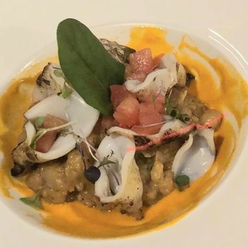 Tortino Restaurant - Grilled squid w garbanzo beans and tomato puree... delicious but was luke warm - Italian Near Me - Washington, DC, District of Columbia