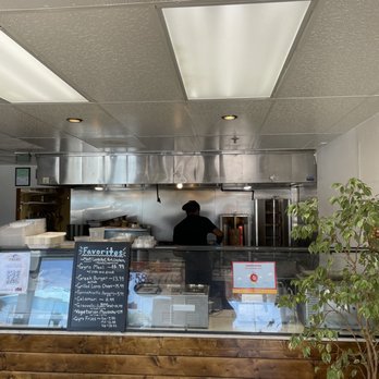 Gyrogrill - a restaurant counter with menus - Greek Near Me - San Diego, California