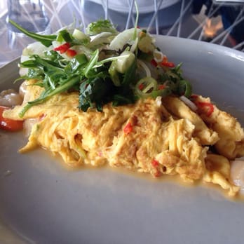 Takapuna Beach Cafe - Scallop omelette with mixed greens on top. - Ice Cream & Frozen Yogurt Near Me - Takapuna, AUK Takapuna Beach Cafe - Scallop omelette with mixed greens on top. - Ice Cream & Frozen Yogurt Near Me - Takapuna, AUK