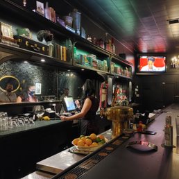a woman working at the bar a woman working at the bar