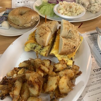Bagel Bar East - Bacon, egg & cheese on a onion bagel and home fries. Chicken salad with plain bagel and coleslaw. - Bagels Near Me - North Miami, Florida