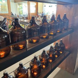 Jugs with little batter operated candles. Unique design throughout the dining area Jugs with little batter operated candles. Unique design throughout the dining area