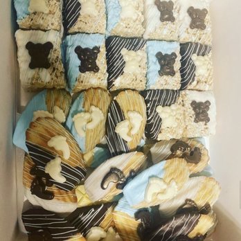 Veronica Vstreats - Rice crispy treats and Madeleine cookies with chocolate Teddy bears and baby foot prints! - Desserts Near Me Veronica Vstreats - Rice crispy treats and Madeleine cookies with chocolate Teddy bears and baby foot prints! - Desserts Near Me
