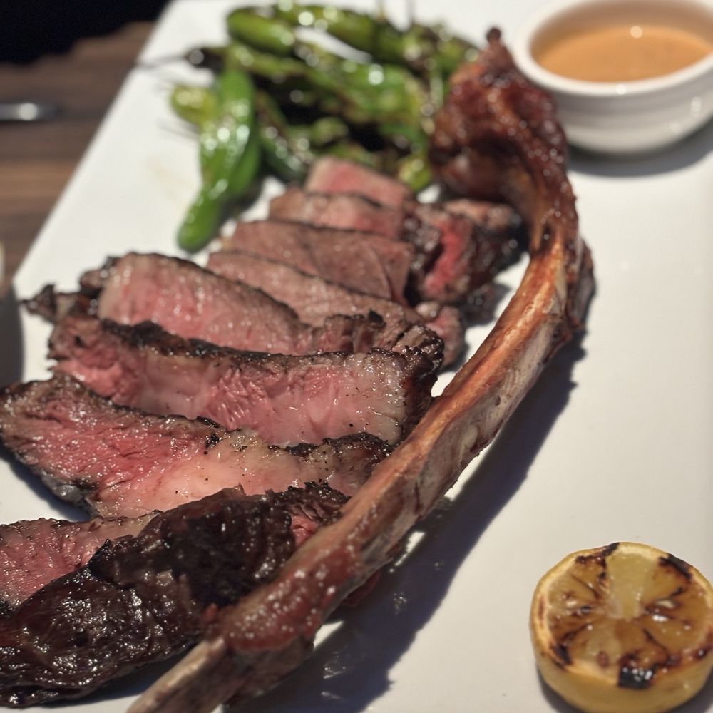 Hestia Kitchen + Bar - Tomahawk w/ shaved foie gras pâté + grilled shishito - Steakhouses Near Me - Richmond, British Columbia Hestia Kitchen + Bar - Tomahawk w/ shaved foie gras pâté + grilled shishito - Steakhouses Near Me - Richmond, British Columbia