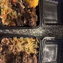 Jerk chicken with the mac &cheese and brown stew chicken with rice and peas. (I started eating then took a picture because it was good lol)