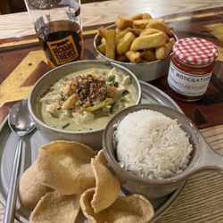 The Moderation - Thai green curry and a side if chips