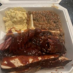 Sayyad's Blackout BBQ - Chicken, Brisket & Sausage with baked beans and potato salad