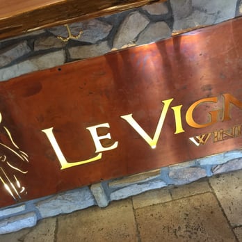 Le Vigne Winery - At the bar at Le Vigne - Wineries Near Me - Paso Robles, California Le Vigne Winery - At the bar at Le Vigne - Wineries Near Me - Paso Robles, California