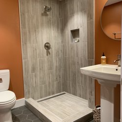 9Construction - Guest bathroom remodel with corner shower