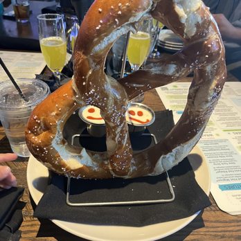 On the Kirb - Massive pretzel... which was super soft and delish.. served with white cheese on the side. - Sports Bars Near Me - Houston, Texas On the Kirb - Massive pretzel... which was super soft and delish.. served with white cheese on the side. - Sports Bars Near Me - Houston, Texas
