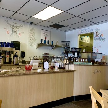 Ground Up Coffee Cafe - Pretty artwork drawn on walls with cute little names for the characters. Very, very clean, meticulous barista - Coffee & Tea Near Me - Littleton, Colorado