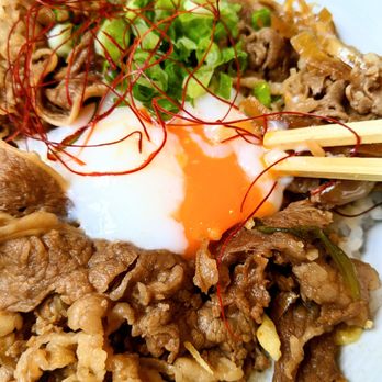 Gozen Shun - Popped yolk in the beef sukiyaki - Japanese Near Me - Pasadena, California Gozen Shun - Popped yolk in the beef sukiyaki - Japanese Near Me - Pasadena, California