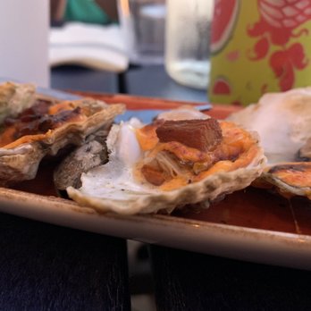 NC Coast Grill & Bar - NC Coast oysters - oven roasted on the half shell, pimento cheese, crispy pork belly, house-pickled jalapeño - New American Near Me - Kitty Hawk, North Carolina NC Coast Grill & Bar - NC Coast oysters - oven roasted on the half shell, pimento cheese, crispy pork belly, house-pickled jalapeño - New American Near Me - Kitty Hawk, North Carolina