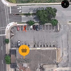 Holiday House Liquor Store - Parking lot.