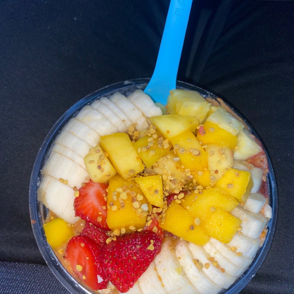 8th Ave Acai Bowl + almond butter + Nutella + strawberry +mango + hemp seeds + half coconut base 8th Ave Acai Bowl + almond butter + Nutella + strawberry +mango + hemp seeds + half coconut base