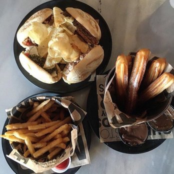 100 Montaditos - Bucket of churros, bucket of fries, platter of sandwiches. Follow my IG @biteofmia for more food pics - Tapas/Small Plates Near Me - Miami, Florida 100 Montaditos - Bucket of churros, bucket of fries, platter of sandwiches. Follow my IG @biteofmia for more food pics - Tapas/Small Plates Near Me - Miami, Florida