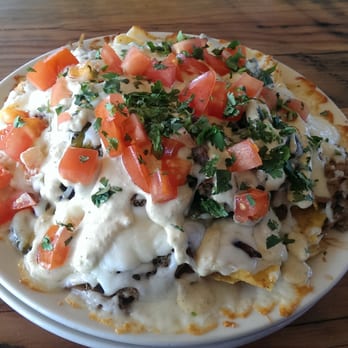 Rustic Goat - 1/2 nachos, $7. I think there was a pricing error. Candied jalelenos really pulled this app together. - American Near Me - Anchorage, Alaska Rustic Goat - 1/2 nachos, $7. I think there was a pricing error. Candied jalelenos really pulled this app together. - American Near Me - Anchorage, Alaska