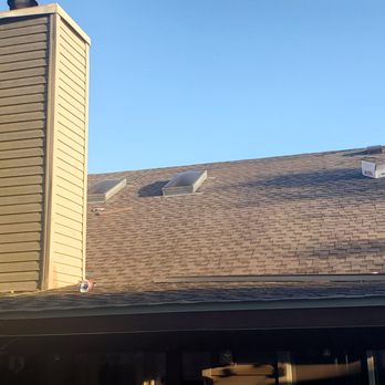 Austin Lone Star Services - Picture of completed back side of our roof.  They even replaced the shingles on our patio roof and storage building roof.  Nothing missed. - Roofing Near Me
