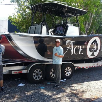 Eye Catchers Signs - Boat wrap - Graphic Design Near Me - Tavernier, Florida Eye Catchers Signs - Boat wrap - Graphic Design Near Me - Tavernier, Florida