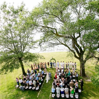 Wades Point Inn On The Bay - Aerial view of a ceremony, photo by Jos Studios. - Hotels Near Me - McDaniel, Maryland