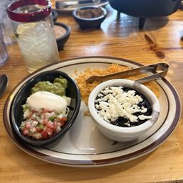 Black beans, rice & sour cream, tomatoes& guacamole Black beans, rice & sour cream, tomatoes& guacamole