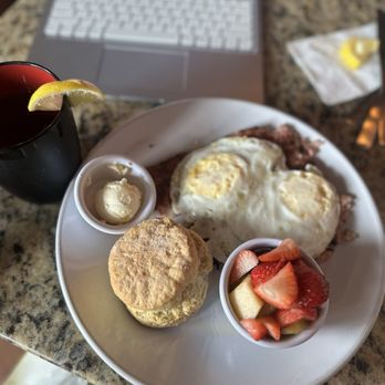 Sage Biscuit Cafe - Downtown - Corned Beef Hash with a side a fresh fruit - Breakfast & Brunch Near Me - Bradenton, Florida Sage Biscuit Cafe - Downtown - Corned Beef Hash with a side a fresh fruit - Breakfast & Brunch Near Me - Bradenton, Florida