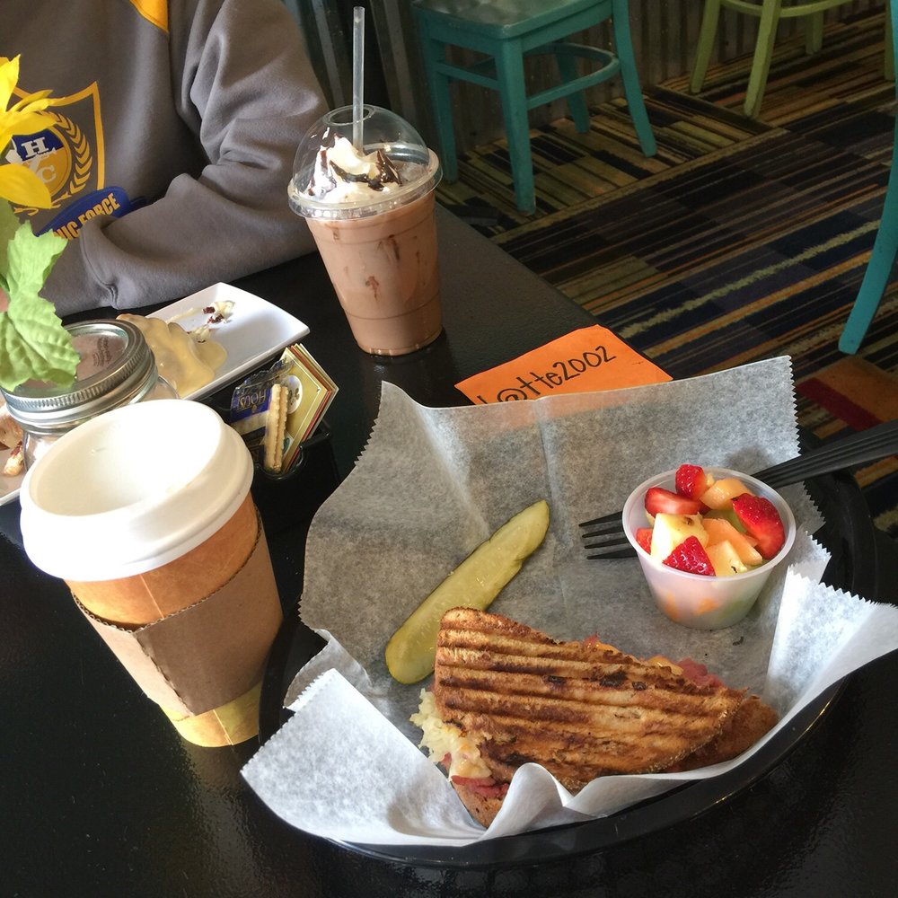 Mug Shotz Cafe - White chocolate mocha and half sandwich of Ruben, pickle, and cup of fruit - Coffee & Tea Near Me - Ahoskie, North Carolina