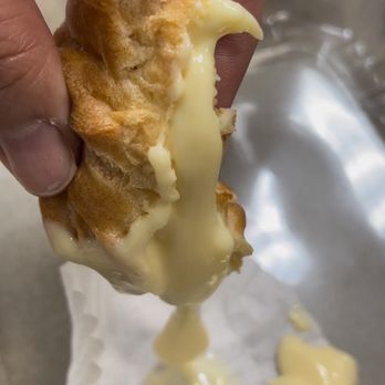 Lee's Sandwiches - Runny liquid in the cream puffs....you bite into this and It had texture of egg yolk on a sunny side up egg. GROSS. - Vietnamese Near Me - Houston, Texas Lee's Sandwiches - Runny liquid in the cream puffs....you bite into this and It had texture of egg yolk on a sunny side up egg. GROSS. - Vietnamese Near Me - Houston, Texas