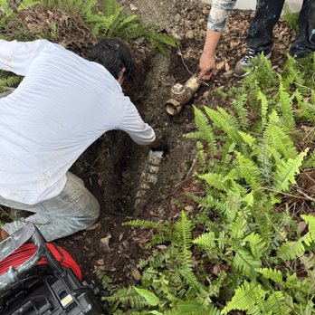 Express Trenchless Sewer Line Repairs - Working on removing the section that was broken - Plumbing Near Me