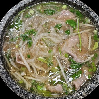 District 7 Pho - Hot Stone Bowl with Rare Steak ($17.95) - Vietnamese Near Me - Las Vegas, Nevada District 7 Pho - Hot Stone Bowl with Rare Steak ($17.95) - Vietnamese Near Me - Las Vegas, Nevada