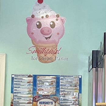 Smithfield Ice Cream Parlor - a pink ice cream cone with a cherry on top - Ice Cream & Frozen Yogurt Near Me - Smithfield, Virginia