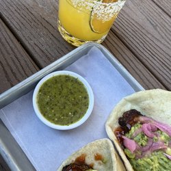 The Last Rodeo - Mango Margarita and pork belly tacos with green sauce