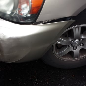 KB's Repair - Bumper was supposed to be replaced. Dent pulled out and painted over. Bumper not attached. Drivers side. - Auto Detailing Near Me - Tacoma, Washington
