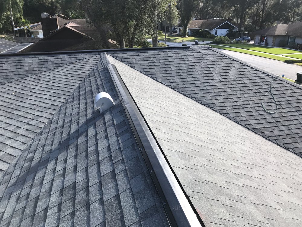 Slide of CB Roofing Construction