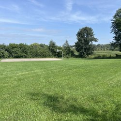 Westport Meadows Park - Basketball court with large nature break behind it