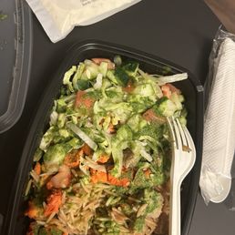 Combo over Rice Chicken and Lamb (I ate some before taking the photo so it doesn't look as beautiful as it should) Combo over Rice Chicken and Lamb (I ate some before taking the photo so it doesn't look as beautiful as it should)