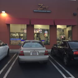 You have to drive around to the front door. Not a lot of parking.