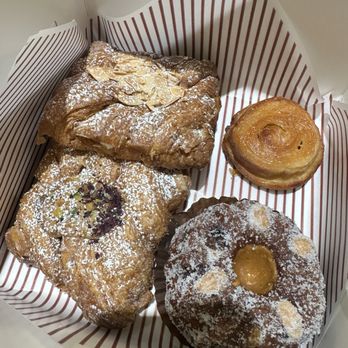 Beaucoup - chocolate almond croissant, pistachio croissant, sticky bandit chocolate kugelhof, and kouign amann - Bakeries Near Me - Vancouver, British Columbia Beaucoup - chocolate almond croissant, pistachio croissant, sticky bandit chocolate kugelhof, and kouign amann - Bakeries Near Me - Vancouver, British Columbia