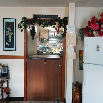 Chong's Carry Out - a kitchen with a refrigerator and a counter - Chinese Near Me - Royalton, Illinois